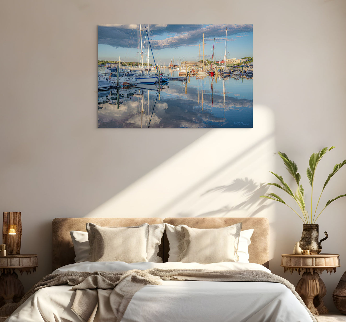 A breathtaking painting titled 'Sunset over Belfast,' showcasing the vibrant hues of a sunset casting a warm glow over the cityscape and serene waters.