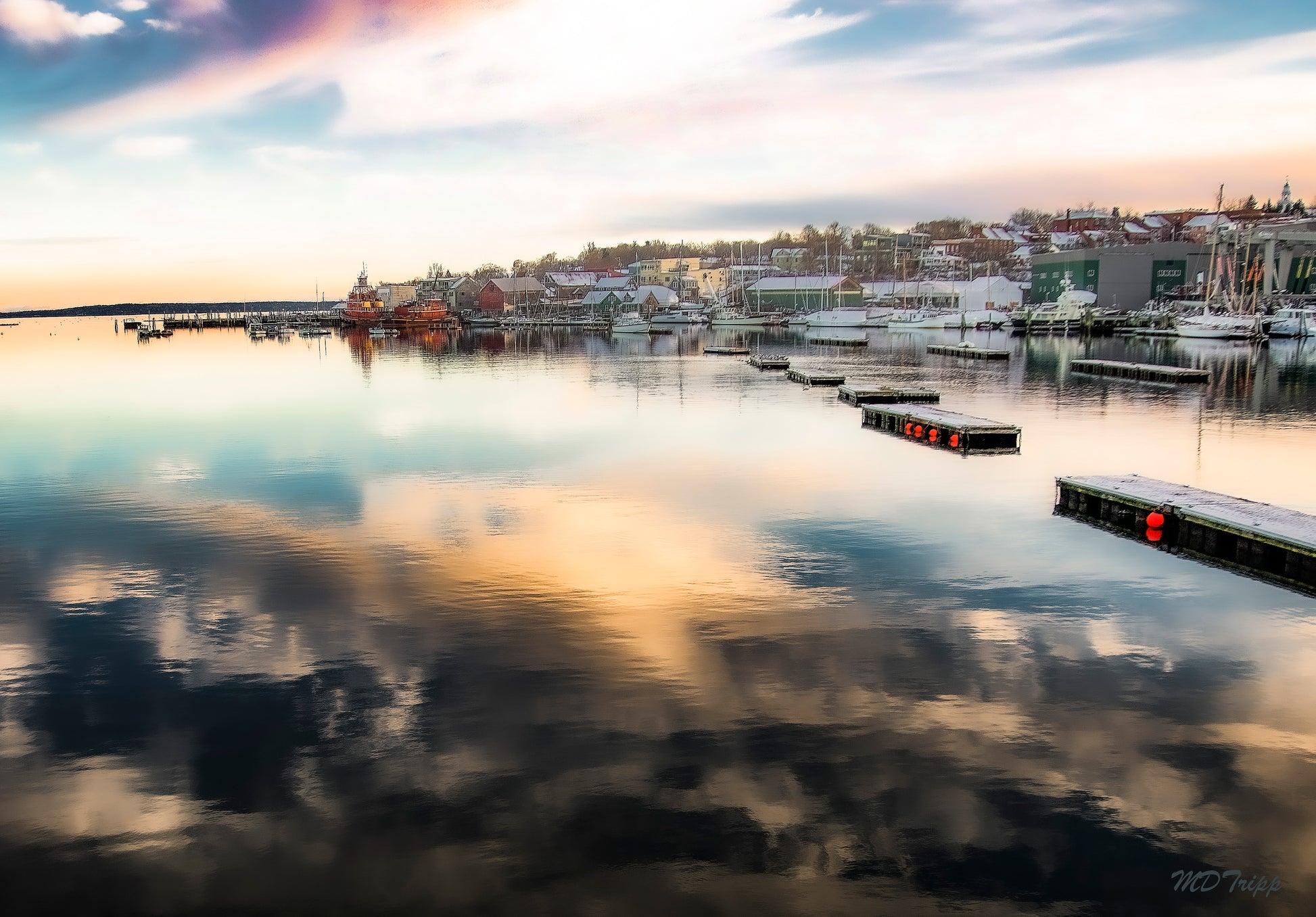 A peaceful painting of the chilly waters of Belfast, showcasing cool tones and a quiet, misty atmosphere over the water.