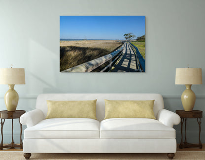 An inspiring painting titled 'Finding My Own Path,' featuring a lone figure walking along a winding trail surrounded by a serene and reflective landscape