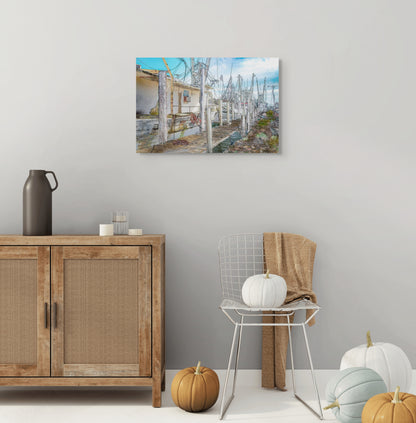A charming painting titled 'Fisherman’s Alley,' depicting a quiet alley lined with fishing boats, nets, and coastal elements, capturing the essence of a waterfront community.