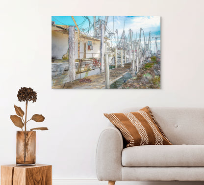 A charming painting titled 'Fisherman’s Alley,' depicting a quiet alley lined with fishing boats, nets, and coastal elements, capturing the essence of a waterfront community.
