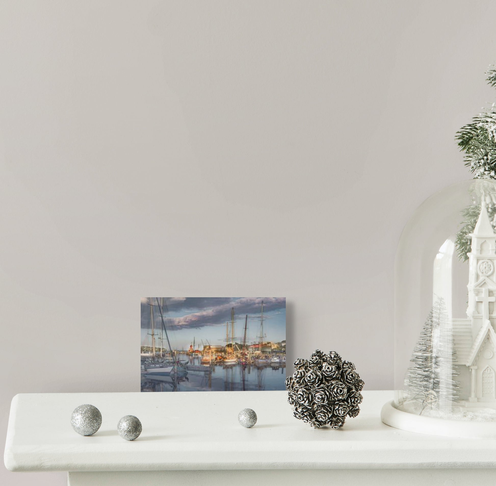 A serene painting titled 'Settling at the End of Day-Belfast,' depicting a tranquil evening scene in Belfast with soft lighting, calm waters, and a peaceful atmosphere.