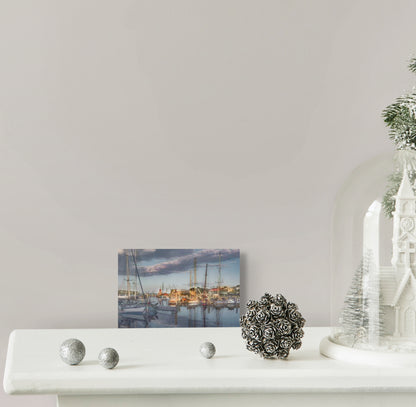 A serene painting titled 'Settling at the End of Day-Belfast,' depicting a tranquil evening scene in Belfast with soft lighting, calm waters, and a peaceful atmosphere.